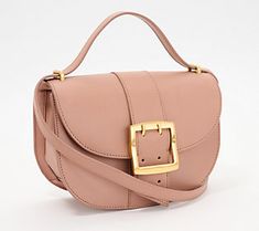 Fashion meets function with the Kapis crossbody, featuring smooth leather, a statement buckle accent, and an adjustable pull-through strap that allows this handbag to be worn on the shoulder or across the body. We love it for its flexibility and organization (but mostly for its incredibly good looks). From Vince Camuto. Tan Crossbody Shoulder Bag With Metal Hardware, Faux Leather Shoulder Bag With Gold-tone Hardware, Purse Vince Camuto, Spring Crossbody Bag With Gold-tone Hardware, Vince Camuto Bag, Pull Through, Purse Accessories, Vince Camuto, The Body