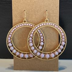 Gold-Tone Metal Fish Hook Pierced Earrings With Pale Blue Flat Circular And Graduated Bead Design Pattern. Trendy Small Hoop Purple Jewelry, Trendy Purple Small Hoop Jewelry, Nickel-free Pink Beaded Hoop Earrings, Pink Circular Nickel-free Jewelry, Adjustable Purple Round Hoop Earrings, Adjustable Purple Hoop Earrings, Elegant Purple Hoop Earrings, Trendy Purple Hoop Jewelry, Trendy Purple Hoop Earrings