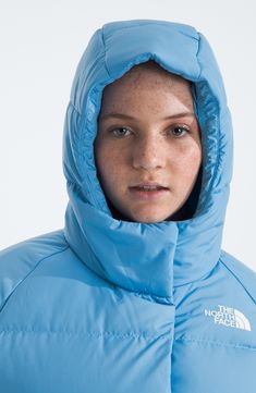 Kids will be happy to have the incredible warmth that this hooded jacket offers with 600-fill-power recycled down and a water-repellent finish. It also incorporates raglan sleeves for easy movement so they can keep moving through the snowy weather. Front zip closure with hook-and-loop storm placket Elastic binding on hood, cuffs and hem Fixed three-piece hood Secure-zip chest and hand pockets Hood is lined with Heatseeker™ Eco synthetic insulation Lined, with 600-fill-power waterfowl down 78 g/m The North Face Nylon Puffer Jacket With Detachable Hood, The North Face Down Puffer Jacket With Detachable Hood, Blue Puffer Jacket With Adjustable Hood For Outdoor Activities, Blue Puffer Jacket With Detachable Hood For Outdoor Activities, Blue Puffer Jacket With Adjustable Hood For Outdoor, Sporty The North Face Puffer Jacket, Blue Hooded Functional Puffer Jacket, Spring Functional Hooded Puffer Jacket, Hooded Puffer Jacket With Drawstring For Outdoor