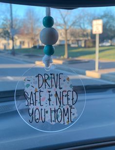 a car window with a sign that says drive safe and need you home