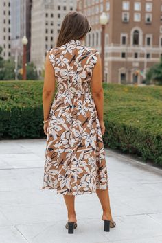 This Floral Midi Dress is our new fall favorite outfit! Looking for a stylish and comfortable dress? Our Brown Floral Zip Up Midi Dress offers both with its cap sleeve, v neckline, and allover floral print design. The zip up front and side pockets add functionality, while the smocked waist provides a flattering fit. Style with strappy heels or cute ankle booties along with some matching accessories to complete the look. Casual Beige V-neck Floral Dress, Spring V-neck Dress With Leaf Print, V-neck Leaf Print Dresses For Spring, Sorority Rush Outfits, Rush Outfits, Gameday Dress, Loungewear Dresses, Casual White Dress, Floral Print Design