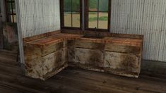 an old wooden bench sitting next to a window in a room filled with wood flooring