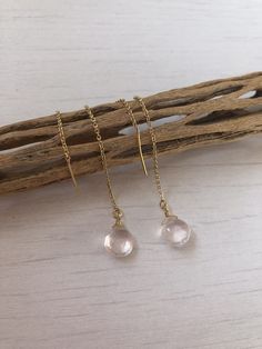 Rose Quartz Threader Earrings, Rose Quartz Modern Earrings, Pink Minimalist Chain Earrings, Dainty Pull Through Earrings, Boho, gift for her Rose Quartz teardrops suspended from 14k gold filled or sterling silver ear threaders. Ideal for a modern look, super clean and minimalistic earrings. Great choice of bridesmaids earrings they can continue to use on a daily basis. Stone Size: 8 mm Stone Shape: Teardrop Earring Length: 35 mm Material: Choice of 14k Gold Filled or Sterling Silver Gift Wrappin Hypoallergenic Dangle Rose Gold Threader Earrings, Hypoallergenic Rose Gold Dangle Threader Earrings, Pink Long Drop Earrings As Gift, Rose Gold Dainty Crystal Earrings For Pierced Ears, Minimalist Rose Gold Linear Earrings For Gift, Minimalist Rose Gold Linear Earrings Gift, Rose Gold Dainty Crystal Earrings, Minimalist Crystal Earrings With Ear Wire For Gift, Gift Linear Drop Earrings With Adjustable Chain