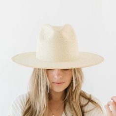 Cove is a hand-crafted fedora that breathes class + sophistication. This classic wide-brim hat is hand woven in Mexico with fine Guatemalan palm straw. A tight, even weave gives Cove its beauty + ensures it will hold its shape for seasons to come. Cove is the hat you’ll want to be seen in. 100% Guatemalan Palm. Fedora crown. Tall crown height. Wide stiff flat brim. Gold plated GP pin on crown. Great sun protection. Dimensions - Crown: 11 cm + Brim: 9.5 cm. Adjustable inner sweat band for added c Gigi Pip, Wide Brim Straw Hat, Native Shoes, Straw Fedora, Thick Rope, Halo Style, Wearing A Hat, Gold Engraving, Wide Brimmed Hats