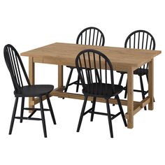 a wooden table with black chairs and a bench on top of it in front of a white background