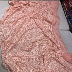 Update! - Zynah covered by LBB - https://lbb.in/bangalore/zynah-designs-handloom-sarees/ Pure Georgette Saree with intricate thread chikankari work. Beautiful motifs like flowers and diamonds are made using different kind of stitches. Sequence handwork is done through out the saree as a highlighter to enhance the beauty of saree. Dyeable to any shade as per your choice and contrast color blouse piece can be provided on demand Length: 5.5 meters Width: 1.2 meters Blouse: Running/attached with sar Chikankari Saree, Chikankari Work, Pure Georgette Sarees, Color Blouse, Readymade Blouse, Georgette Saree, Pastel Shades, Georgette Sarees, Handloom Saree