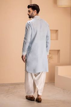 Buy Sky Blue Linen Embroidered Dori Kurta With Salwar For Men by AMIT ARORA Online at Aza Fashions. Elegant Cotton Sherwani With Dabka Work, Unstitched Cotton Suit For Traditional Ceremonies, Traditional Cotton Lawn Suit With Naqshi Details, Traditional Cotton Lawn Suit With Naqshi, Light Blue Cotton Kurta For Diwali, Elegant Cotton Traditional Wear With Dabka, Transitional Season Cotton Sherwani With Traditional Fit, Blue Linen Long Sleeve Sets, Light Blue Cotton Kurta With Chikankari Embroidery