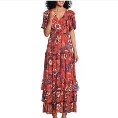 From Nurture By Westbound, This Dress Features: A-Line Silhouette V-Neckline Short Sleeves Pullover Construction Approx. 54.75" In Length Rayon Machine Wash/Tumble Dry Imported. Approx: Pit To Pit 17.5” Waist 13.5” ( Unstretched) It Stretches To About 16” Casual V-neck Maxi Dress With Ditsy Floral Print, V-neck Ditsy Floral Print Vacation Dress, V-neck Ditsy Floral Print Dress For Vacation, Patterned Floral Print V-neck Maxi Dress, Bohemian Tiered Floral Dress For Beach, Casual Floral Dress With Boho Print, Casual Boho Print Floral Dress, Bohemian Floral V-neck Dress For Brunch, Bohemian Tiered Floral Dress