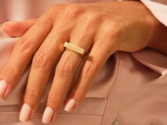 This timeless signet ring, crafted from sleek 14k gold (available in yellow, white, or rose gold), embodies sophistication and heritage. Featuring a sleek, elongated rectangular signet face, this ring is perfect for those who appreciate a clean and versatile design. The elongated rectangular face of the ring provides a clean canvas for personalization. It can be left unadorned for a minimalist look, or engraved with a family crest, monogram, or meaningful symbol to create a unique heirloom piece Rectangular Face, Crest Monogram, Family Crest, Signet Ring, Gold Yellow, Or Rose, Gold Ring, Yellow White, Solid Gold