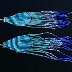 These Long, Hand Beaded Earrings Are Beautiful And Unique. Shades Of Blue And Turquoise Blend Together In A Lovely Ombre Design. They Are Hand Beaded And Beautiful. These Distinctive Earrings Feature French Hooks Aka Fishhooks. Order Includes 2 Silicone Earring Backs (Not Pictured) For Security. Blue Large Beads Dangle Earrings, Blue Large Beaded Dangle Earrings, Blue Adjustable Beaded Earrings For Pierced Ears, Adjustable Blue Beaded Earrings For Pierced Ears, Blue Beaded Drop Earrings With Large Beads, Blue Large Beads Drop Earrings, Blue Large Beaded Drop Earrings, Adjustable Blue Earrings With Large Beads, Adjustable Beaded Blue Earrings