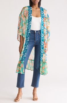 , layered look. ultrachicVivacious printing blooms across a lightweight duster featuring dramatic wide sleeves for an Open front Three-quarter sleeves 100% polyester Hand wash, dry flat Imported Green Spring Outerwear For Vacation, Green Outerwear For Spring Vacation, Green Outerwear For Vacation In Spring, Spring Beach Kimono With 3/4 Sleeve, Bohemian Summer Outerwear With 3/4 Sleeves, Bohemian Outerwear With 3/4 Sleeves For Summer, Green Printed Spring Outerwear, Spring Beach Outerwear With 3/4 Sleeves, Floral Print Open Front Outerwear For Layering