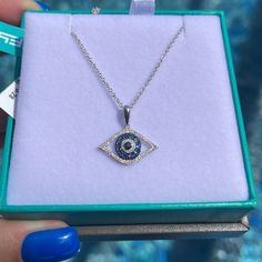 New With Tags Evil Eye Necklace Featuring Dazzling Diamonds And Gorgeous Blue Sapphire. Sapphire, 0.28 Tcw Diamond/Black Diamond, 0.14 Tcw 14k White Gold Lobster Clasp Imported Size Length, About 18" Pendant, About 3/4" Wide X 7/16" High Now Retails For $1,595 Plus Taxes. Please Visit Our Store For More Effy Jewelry. We Are Based In Florida And Ship Packages Every Business Day Very Fast! Signature Confirmation Required Upon The Delivery. Sterling Silver Round Diamond Necklace For Evening, Sterling Silver Diamond Necklace For Evening, Evening White Gold Sterling Silver Diamond Necklace, Luxury Sapphire And Diamond Necklace In Silver, Luxury Blue Diamond Pendant Necklace, Luxury Blue Pendant Diamond Necklace, Silver Sterling Silver Diamond Necklace For Evenings, Silver Sterling Diamond Necklace For Evening, Luxury Blue Diamond-cut Necklace