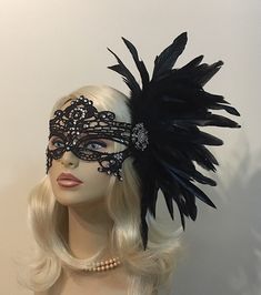 "Black Lace Masquerade Mask with Feathers and Crystals, Women's Lace Mask, Masked Ball, Wedding Masquerade Masks, Bridal Wedding Mask Beware of cheap imitations that use glue! This is an original design by IceGreenEyes. Stiffened and lace mask will not sweat your face like the cheap plastic ones. The mask is also shaped so you have lots of room around the eyes instead of a skinny slice. These masks are hand stitched, not held together with sticky glue that will heat up and fall apart before the Black Masquerade Mask For Halloween Wedding, Elegant Formal Mask For Carnival, Elegant Formal Masks For Carnival, Black Masquerade Mask For Wedding Carnival, Elegant Wedding Masks, Elegant Masquerade Mask For Wedding And Mardi Gras, Wedding Masquerade Mask With Rhinestones, Elegant Black Headpiece For Carnival, Elegant Black Formal Mask