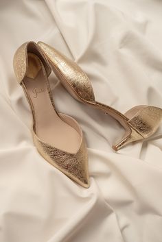 Elegant Gold Kitten Heels, Gold Kitten Heels With 4-inch Heel, Chic Gold High Heel Wedding Shoes, Gold High Heel Chic Wedding Shoes, Elegant Gold Kitten Heels For Gala, Chic Gold Wedding Shoes With Padded Heel, Gold Pointed Toe Leather Heels, Gold Kitten Heels For Formal Occasions, Gold Low Heel Heels With Deep Heel Cup