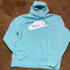 Nike Hoodie Size Small Light Aqua Blue So Pretty Euc-Like New Big Front Pocket, Pullover From A Smoke Free & Pet Free Home Very Comfortable, Durable And Roomy Fall & Winter Are Coming. Perfect For Evening Times Outside By The Firepit Making Smores! You’ll Just Love The Color! Aqua Blue With White Lettering In Perfect Condition. Only Worn A Couple Of Times. Nike Blue Hoodie With Adjustable Hood, Blue Sportswear Hoodie For Spring, Blue Long Sleeve Outerwear With Logo Print, Light Blue Fleece Sporty Sweatshirt, Light Blue Long Sleeve Sports Sweatshirt, Blue Logo Print Sweatshirt For Spring, Blue Fleece Sweatshirt With Logo, Blue Fleece Sweatshirt With Logo Print, Blue Fleece Tops With Logo Print