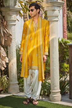 Mustard straight kurta featuring zari threads and mirror work all over. Paired with an embroidered dupatta and a solid salwar. - Aza Fashions Haldi Dress For Groom, Haldi Ceremony Outfit For Men, Western Outfits For Men, Haldi Ceremony Outfit, Haldi Dress, Haldi Outfits, Salwar Pants, Yellow Kurta, Haldi Outfit