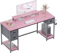 a pink desk with two drawers and a computer monitor