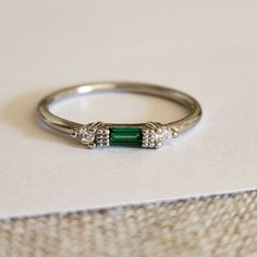 New 925 Silver Filled Emerald Diamond Band Stacking Ring For Women Stamped 925. All Gemstones Are Simulated. A Jewelry Box Included. Ready To Ship Same Day. Feel Free To Ask Any Question. All Photos Are Real Time From Actual Object No Stock Photo Used. Color Might Be Slightly Different Due To Lighting. Silver Emerald Cut Stackable Rings Fine Jewelry, Dainty Silver Jewelry In 14k White Gold, Dainty 14k White Gold Silver Jewelry, Fine Jewelry Sterling Silver Stackable May Birthstone Rings, Silver Emerald Ring In 14k White Gold, Silver Emerald Jewelry With Bezel Setting, Silver Stackable Promise Rings With May Birthstone, Silver Emerald Ring With Diamond, Silver Diamond Emerald Ring Birthstone