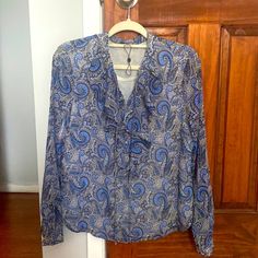 Brand Tommy Hilfiger Size Medium Colors Blue White And Gray Condition - New Without Tag, Never Worn. No Signs Of Wear And Tear Ruffles In The Front As Seen In The Video Where I’m Shaking The Top Tommy Hilfiger Long Sleeve Blouse, Casual Blue Paisley Print Tops, Tommy Hilfiger Long Sleeve Blouse For Spring, Blue Paisley Print Casual Blouse, Blue Paisley Print Top For Fall, Casual Long Sleeve Paisley Print Blouse, Casual Long Sleeve Blouse With Paisley Print, Elegant Long Sleeve Tops By Tommy Hilfiger, Elegant Long Sleeve Tommy Hilfiger Tops