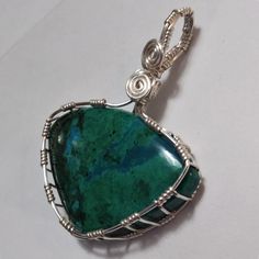 Chrysocolla | Wire Wrapped Pendant | Earth's Natural Art & Jewelry Wire Wrapped Teardrop Cabochon, Wire Wrapped Tumbled Stone, Green Wire Wrapped Silver-plated Jewelry, Artisan Wire Wrapped Silver Plated Jewelry, Turquoise Wire Wrapped Silver-plated Jewelry, Artisan Wire Wrapped Jewelry In Silver Plated Wire, Turquoise Wire Wrapped Silver Plated Jewelry, Weaving Rocks, Green Aesthic