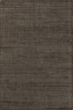 an area rug with dark brown colors