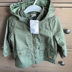 New With Tags! Absolutely Adorable H&M Baby Field Jacket. Size 6-9 Months But I Think It Could Easily Fit Up To 12 Months. Unisex. Detachable Hood. Cotton Outerwear With Adjustable Hood For Playtime, Casual Outerwear With Adjustable Hood For Playtime, Cotton Hooded Jacket For Playtime In Fall, Spring Hooded Outerwear For Playtime, Cotton Outerwear With Pockets For Playtime, Casual Green Outerwear For Playtime, Spring Cotton Outerwear For Playtime, Green Outerwear For Playtime In Fall, Green Long Sleeve Outerwear For Playtime