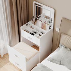 a white vanity with drawers and makeup on it