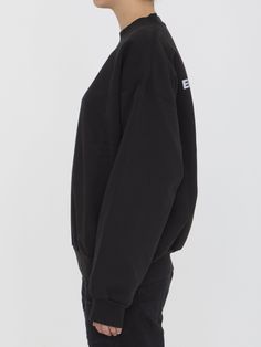 This black cotton jersey sweatshirt features a long-sleeved crewneck design, complete with both the Balenciaga Activewear logo on the front and back. It also has a ribbed collar, cuffs, and hem for a comfortable, regular fit. Size nationality: US Product number: 3304911 Product code: 697869TQVT81083 Composition: 100% cotton Black Crew Neck Sweater With Ribbed Collar, Drop Shoulder Sweats With Ribbed Cuffs For Streetwear, Urban Sweater With Ribbed Cuffs, Urban Long Sleeve Sweater With Ribbed Cuffs, Oversized Black Sweater With Ribbed Collar, Black Cotton Sweater With Ribbed Neckline, Streetwear Long Sleeve Hoodie With Ribbed Waistband, Black Crew Sweatshirt With Ribbed Collar, Long Sleeve Hoodie With Ribbed Waistband For Streetwear