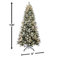 a christmas tree with white lights and snow flakes on the top, measurements for height