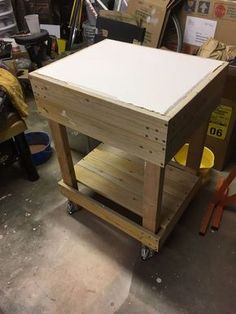 a workbench in a garage with some tools on it