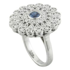 Stamped: 14K Total Ring Weight: 6.2 Grams Sapphire Weight: 0.70 Carat (5.40 Millimeters) Diamond Weight: 1.00 Carat (F-G Color, VS2-SI1 Clarity )Face Measures: 21.30x21.30 Millimeter SKU: [600272] 14k White Gold Diamond Ring, Gold Diamond Ring, White Gold Diamond Rings, White Gold Diamonds, Precious Metals, Gold Diamond, Diamond Ring, Vintage Jewelry, Sapphire