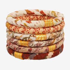 Upcycled sari fabrics and make a statement in these beautiful, blissful bangles. Named after the Sanskrit word "Nirvanam" for bliss. Fabric Bangles, Thread Bangles Design, Wrap Bangles, Thread Bangles, Bangles Design, Sari Fabric, Good To Know, Fabric Beads, Bangle Designs