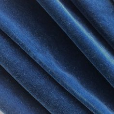 close up view of blue velvet fabric