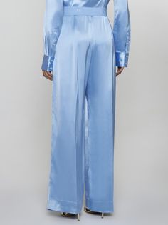 Stine Goya's Ciara light blue viscose satin trousers featuring a logo-tape high elasticated waistband and wide, straight leg with ironed crease. Composition: 100% viscose FSC Scandinavian Aesthetic, Stine Goya, Chloe Purses, Satin Trousers, Zimmermann Dress, Pleats Please Issey Miyake, Jeans Jumpsuit, Yoga Wear, Skirt Suit