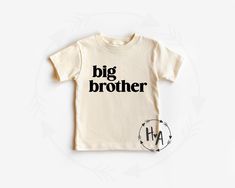 "'BIG BROTHER' - let your little guy tell the world he's going to be a big brother in this cute and comfy tee! Great for announcement and sibling photos, makes a sweet gift, and perfect for wearing anytime he wants! Natural color shirt with vinyl font in color of your choice. HOW TO ORDER: * Select A Color Combo * Select A Size - size chart in image gallery * Select Your Quantity * Add to Cart (\"buy now\" will take you directly to checkout | \"add to cart\" will allow you to continue shopping) Big Sister Announcement Shirt, Big Brother Announcement Shirt, Matching Sibling Shirts, Big Brother Announcement, Sister Announcement, Big Sister Announcement, Cute Bodysuits, Big Brother Tshirt, Baby Announcement Shirts