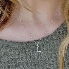 Simple, classic style, sterling silver cross on sterling silver chain, where everyday, layer with another amazing chain for the layered look. Our materials make for an amazing, quality piece of jewelry, made with sterling silver chain and a sterling silver cross. sterling silver chain 18 x 13 sterling silver cross Sterling Silver Cross Necklace With Adjustable Chain, Sterling Silver Crucifix Cross Necklace With Adjustable Chain, Sterling Silver White Gold Cross Necklace With Adjustable Chain, White Gold Sterling Silver Cross Necklace With Adjustable Chain, Silver Cross Pendant Charm Necklaces, Silver Cross Necklace With Delicate Chain, Sterling Silver Crucifix Necklace With Silver Chain, Silver Crucifix Necklace For Everyday, Everyday Silver Crucifix Jewelry