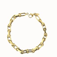 Elevate his style with the timeless elegance of our 18k Solid Yellow Gold Link Bracelet. This exquisite 8-inch piece, weighing 10 grams, is expertly crafted in Italy and captures the essence of sophistication. A perfect gift for men, its hypoallergenic 18k gold construction ensures both quality and comfort. Delivered in an Amalia blue gift box, this bracelet is not just an accessory, but a statement of refined taste Classic Stainless Steel Bracelet For Everyday Wear, Minimalist Gold-tone Bracelets For Formal Occasions, Classic Jubilee Link Chain Bracelet, Classic Jubilee Chain Bracelet, Classic Link Bracelets With Solid Link Construction, Classic Chain Bracelet With Solid Link Construction, Metal Link Bracelets With Gold Clasp, Classic Gold-tone Charm Bracelet, Everyday Metal Bracelets With Gold Clasp