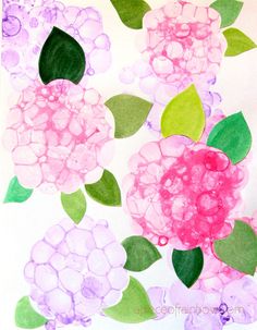 an art project with watercolor flowers and leaves