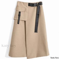 Katykey - Chic Beige High-Waisted Split Irregular Midi Skirt - Figure-Flattering and Knee Length Asymmetrical Beige Bottoms For Spring, Asymmetrical Solid Skirt With Pockets, Solid Asymmetrical Skirt With Pockets, Chic Asymmetrical Skirt With Pockets, Asymmetrical Cargo Skirt For Spring Workwear, Solid Color Asymmetrical Skirt With Pockets, Asymmetrical Beige Bottoms For Work, Spring Asymmetrical Cargo Skirt For Work, Fall Skirt With Pockets And Asymmetrical Hem