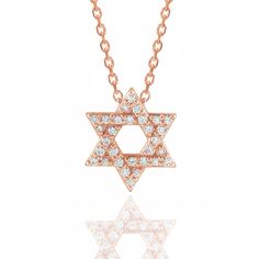 The Star of David is a powerful representation of Jewish identity and pride. It is worn as a symbol of connection to the Jewish faith, culture, and heritage. Crafted with precision and adorned with dazzling diamonds, this necklace features a stunning Star of David pendant in genuine 14k gold. The intricate design showcases the brilliance of diamonds, adding a touch of sparkle to this cherished symbol of Judaism.Whether worn as a daily affirmation of faith or as a special piece for significant oc Luxury Diamond Necklace Star Of David, Star Of David Necklace With Single Cut Diamonds, Luxury Star Of David Necklace With Diamond Accents, Luxury Star Of David Necklace For Anniversary, Star Of David Necklace With Diamond Accents For Anniversary, Luxury Diamond Necklace In Star Of David Shape, Star Of David Necklace With Diamond Accents As Gift, Star Of David Necklace With Diamond Accents For Gift, Star Of David Necklaces With Diamond Accents For Gift