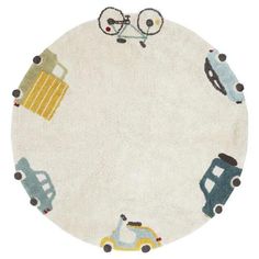 a round rug with cars and trucks on the front in various colors, shapes and sizes