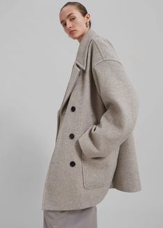 Calgary Oversized Wool Peacoat - Beige – The Frankie Shop Classic Oversized Pea Coat With Pockets, Oversized Wool Outerwear In Beige, Beige Oversized Wool Coat With Lapel Collar, Oversized Classic Pea Coat For Fall, Oversized Winter Outerwear With Welt Pockets, Oversized Notch Lapel Pea Coat For Fall, Oversized Neutral Outerwear With Buttons, Chic Oversized Outerwear With Welt Pockets, Oversized Business Pea Coat With Pockets