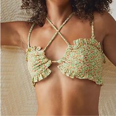 Ivory Combo This Sweet Bandeau Bra Features A Ruched, Ruffle-Adorned Silhouette With Front Keyhole Detailing And Smocked Back Band For Effortless Ease. Also Features Adjustable/Removable Straps! 100% Rayon Green Halter Top With Built-in Bra For Summer, Summer Bandeau Halter Top With Straps, Orange Halter Top For Spring Beach Occasions, Orange Halter Top For Beach In Spring, Spring Vacation Swimwear With Removable Bra Pads, Spring Vacation Swimwear With Crisscross Straps, Spring Orange Swimwear With Adjustable Straps, Orange Swimwear With Adjustable Straps For Spring, Spring Green Swimwear With Straps