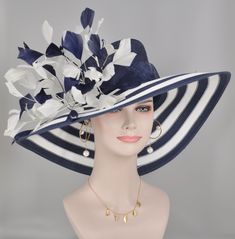 Dear customer: I will be traveling from July 15th to August 21st, 2024, and the store will be closed during this period. If you need any hats during this time, please place your orders in advance. Thank you again for your kindly understanding and support!Fabrication 100% sinamay with  Fabric Jumbo Flower and Feather Flowers.  Style# bucket Size One size for teens and ladies, adjustable string inside can give you the best fit Head measurement Adjustable Size( From 21 inches to 22.5 inches) Brim 6.7 inches Base hat color available Black w white, Powder blue w White, Navy Blue w White, Dusty Pink w White, Hot Pink w Orange Feathers color Tell me you need 💃1. All hats will be sent from Rockville, MD, 20850, using FedEx Ground (1- 5 business days if the shipping box circumference is above 263 Blue Chic Straw Hat For Summer, Chic Blue Straw Hat For Summer, Blue Straw Hat For Summer Parties, Blue Mini Hat For Beach, Navy Hat For Spring, Elegant Navy Hats With Curved Brim, Blue Chic Straw Hat With Curved Brim, Elegant Navy Hat With Curved Brim, Navy Flat Brim Hat For Summer