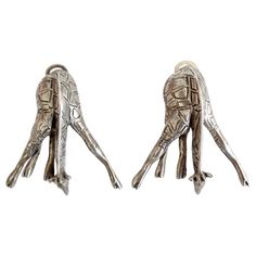 Accessorize with a statement! Circa 1980s, these silver plated earrings feature a bowing giraffe complete with detailed carving and clip-on closures. The perfect piece of statement jewelry to show off your love for vintage! 3 inches long Earrings Fancy, Whimsical Flower, Earrings Bridesmaid, Gold Clips, Crystal Flower, Affordable Jewelry, Floral Earrings, Fun Earrings, Bridesmaid Earrings