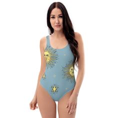 This one-piece swimsuit for all figures will bring out your best features. Enjoy the smooth fabric and the flattering design, and show it off by the sea or pool! * 82% Polyester, 18% Spandex * Fabric weight: 6.78 oz/yd² (230 g/m weight may vary by 5% * Chlorine-resistant fabric * Cheeky fit with a scoop neckline and a low scoop back * Zig-zag stitching * Double-layer front  * Four-way stretch material stretches and recovers on the cross and lengthwise grains This product is made especially for y Blue Surfing Bodysuit For Beach Season, Beach Season One-piece Lined Leotard, Blue Bodysuit For Surfing, Beach Season, One-piece Leotard With Lined Body For Beach Season, Sleeveless One Piece Swimsuit For Beach Season, Sleeveless One Piece Swimwear For Beach Season, Sleeveless One Piece Swimsuit For Beach, Sleeveless One-piece Swimsuit For Beach Season, Summer One-piece Swimming Bodysuit