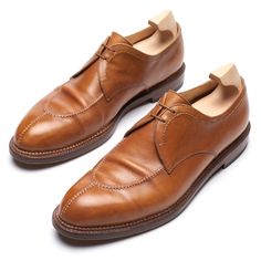 Original Retail Price: $2490 Pre-owned, Excellent Made by S. Lattanzi for Brioni Brioni's Size: 9 US Size: 10 Cognac Color Made of Leather Derby, 2 Eyelet Dover Split Toe Hand-sewn Norwegian Apron Rubber Topy on Leather Sole Made In Italy NOT Included Shoe Trees, Bags, and Box Outsole: 12.25" Width: 4.25" This product is located in our EU warehouse. Fitted Cognac Oxfords With Leather Sole, Elegant Cognac Oxfords For Derby, Fitted Cognac Dress Shoes For Formal Occasions, Elegant Cognac Oxfords With Goodyear Welt, Elegant Goodyear Welted Cognac Oxfords, Elegant Cognac Oxfords With Almond Toe, Elegant Cognac Oxfords For Semi-formal Occasions, Elegant Cognac Almond Toe Oxfords, Elegant Cognac Dress Shoes With Goodyear Welt