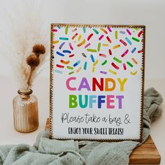 a sign that says candy buffet please take a bag and enjoy your sweet treats with sprinkles