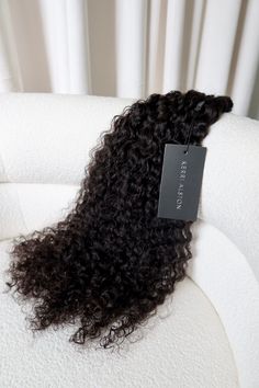 (PRE-ORDER) Ship date approx 3 weeks from order date. Our Twirl Curl Wefts have a tight and voluminous curl pattern that forms deep, spiral-like curls. The curls are often more tightly coiled than loose curls or wavy extensions, giving a lush, textured look. The texture of deep curly extensions is soft and bouncy, with a natural, springy feel. It provides a lot of volume and dimension to your hairstyle. Each bundle has a generous 100-gram weight (approx) Purchase Recommendations and Extension De Wavy Extensions, Curly Hair Bundles, Extension Training, 1st August, Curly Extensions, Hair Extension Brands, Weave Extensions, August 1st, Voluminous Curls