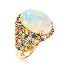 Ross-Simons - Ethiopian Opal, 2.20ct t. w. Multicolored Sapphire Ring in 14kt Yellow Gold. Size 9. The party never stops - at least not when this ring's on your finger! A 16x12mm oval Ethiopian opal cabochon beams its iridescent hues inside a flashy band bedazzled with 2.20 ct. t. w. multicolored sapphire rounds. Crafted in 14kt yellow gold. 3/4" wide. Multicolored sapphire and Ethiopian opal ring. Opal birthstones are the perfect gift for October birthdays. October Birthdays, Ethiopian Opal Jewelry, Opal Birthstone, Opal Wedding Rings, Ethiopian Opal Ring, Ring Opal, Sparkly Jewelry, Yellow Gold Jewelry, Bling Rings